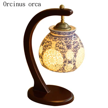 Novo Chinês clássico oco de led de cerâmica lâmpada da tabela do quarto lâmpada de cabeceira-Americano de Pastoral criativa lâmpada de mesa de madeira maciça